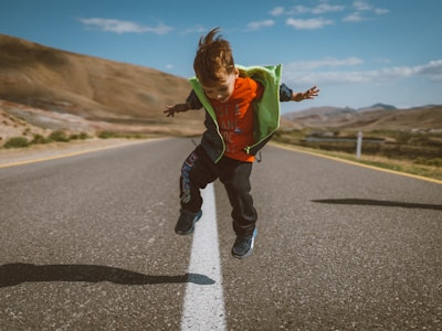 Child drawing with crayons